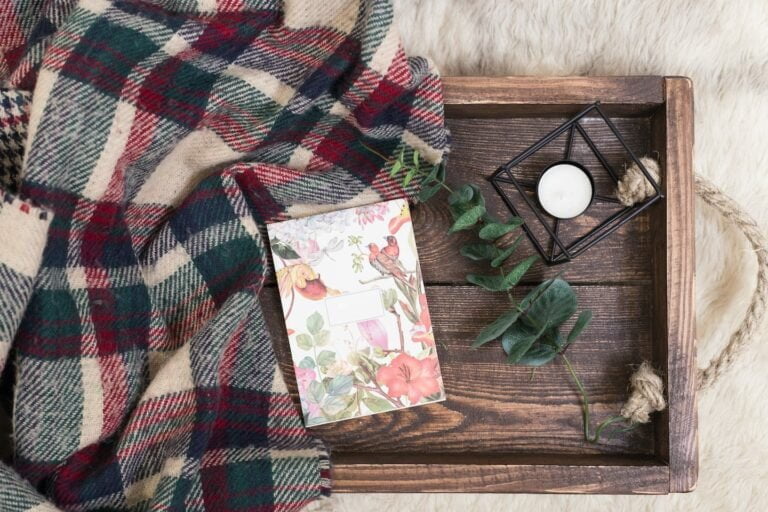 white-desk-with-opened-notebook-top-view-flat-lay-PRKFWHX